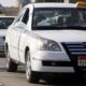 Careem Announces Surprise Integration of 42,000 White Taxis in Egypt, New white taxis are seen on a road in downtown Cairo