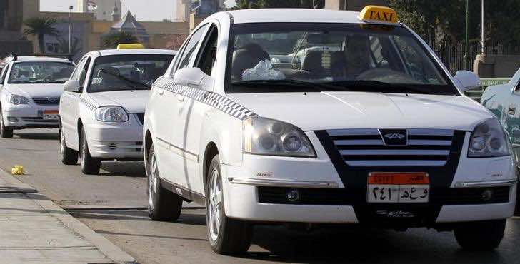 Careem Announces Surprise Integration of 42,000 White Taxis in Egypt, New white taxis are seen on a road in downtown Cairo