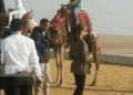 Will Smith riding camel in the Pyramids area