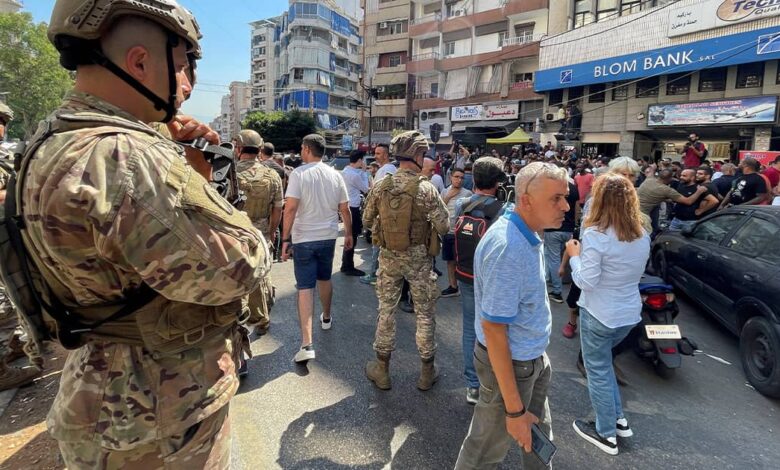 Financial collapse in Lebanon results in armed storms into four commercial banks, Banks strike